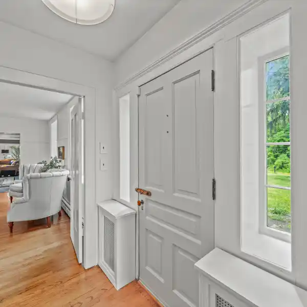 CONTEMPORARILY RENOVATED 1856 COBBLESTONE FARMHOUSE