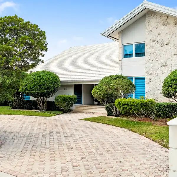 EXQUISITE MID-CENTURY MODERN PROPERTY IN PRESTIGIOUS BAY HARBOR ISLANDS