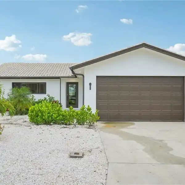 REMODELED WATERFRONT POOL HOME IN PRIME LOCATION