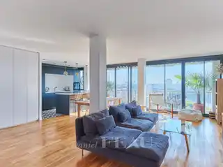 Sunlit 14th Floor Apartment with Seine Views