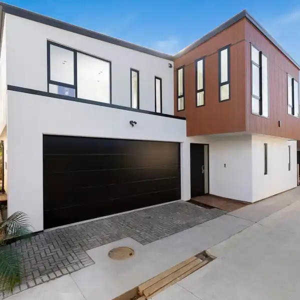 BRAND-NEW CONTEMPORARY HOME WITH BLUE-CHIP LIFESTYLE