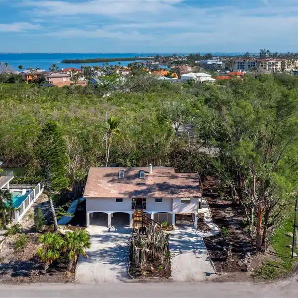 ELEVATED WATERFRONT HOME ON THE NORTH END OF LONGBOAT KEY