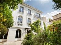 BEAUTIFUL THREE LEVEL HOME WITH A PRIVATE BACKYARD