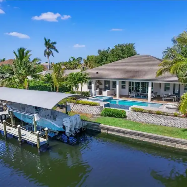 LUXURIOUS WATERFRONT LIVING IN A PREMIER COMMUNITY