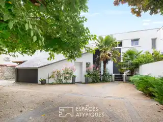 Architect-Designed Haven Surrounded by Lush Garden