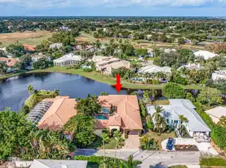 Elegant Courtyard Estate with Lake Views and Guest House