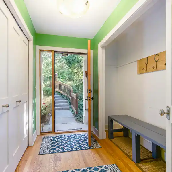 TURNKEY CEDAR-SHINGLED CHARMER ON PRIVATE 150-ACRES