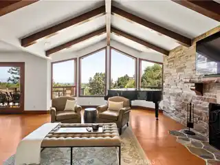 Designer Hillside Estate with Garden Oasis Views