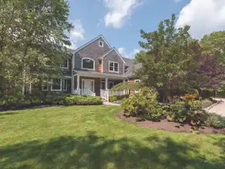 Refined Quogue Retreat with Tennis and Poolside Luxury