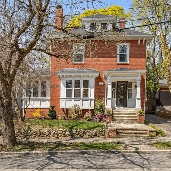THOUGHTFULLY REIMAGINED BRICK COLONIAL REVIVAL