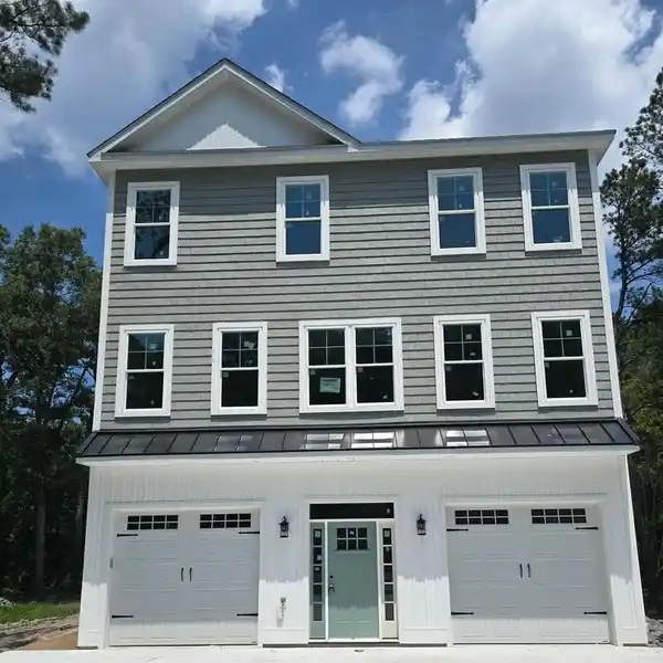 BEAUTIFUL COASTAL HOME ON AN OVERSIZED LOT