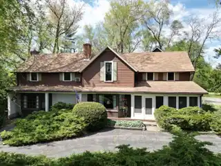 Spacious Home on 110 Acres with Barn and Pond