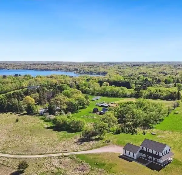 CHARMING FARMHOUSE ON 11-PLUS ACRES