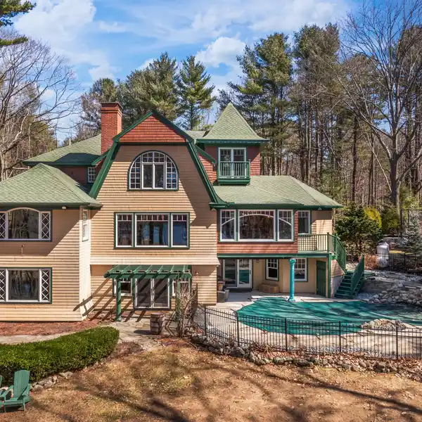 SHINGLE-STYLE HOME WITH CARRIAGE HOME ON OVER SIX ACRES