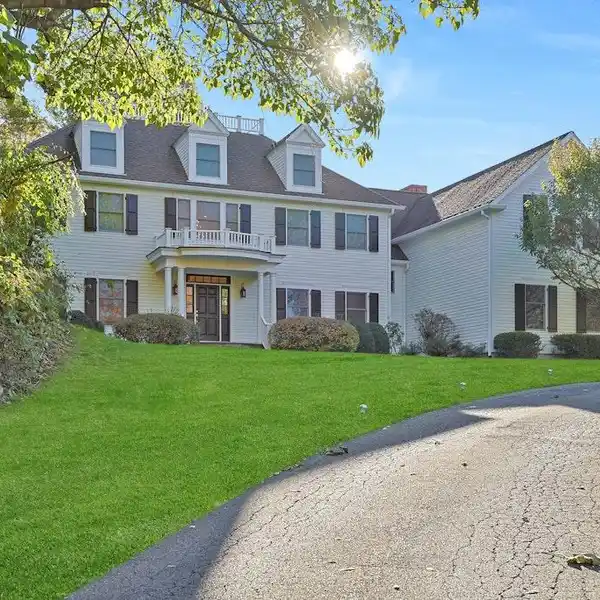 MAJESTIC COLONIAL IN SOUGHT-AFTER BEDFORD CORNERS