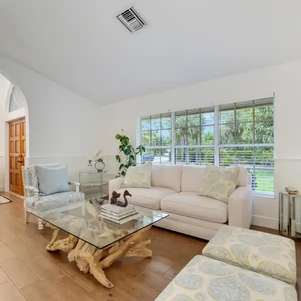 IMPECCABLY MAINTAINED HOME ON A PRIVATE ACRE-PLUS