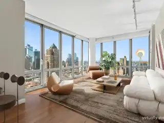 Sun-Filled Corner Home High Above Midtown