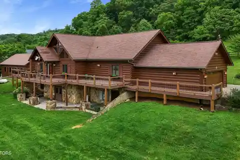 Massive Log Cabin Home on Expansive Acreage