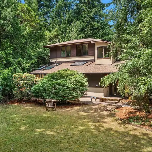 MID-CENTURY GEM ON FIFTEEN FORESTED ACRES