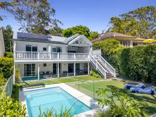 Coastal Retreat with Cathedral Ceilings and Pool