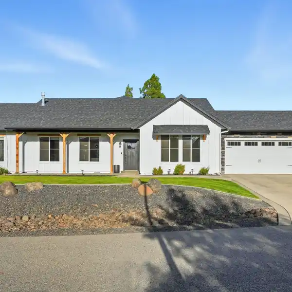 MODERN FARMHOUSE IN LUXURIOUS GATED COMMUNITY