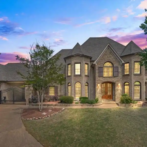 CUSTOM HOME ON A HALF-ACRE COVE LOT