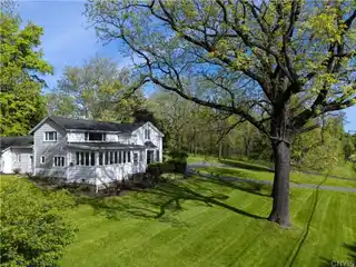 Charming Farmhouse on Expansive Private Lakefront