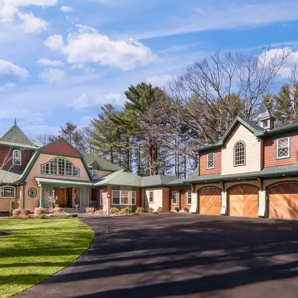 SHINGLE-STYLE HOME WITH CARRIAGE HOME ON OVER SIX ACRES