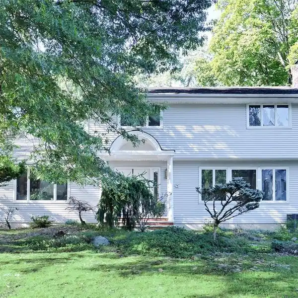 WELL-KEPT CENTER HALL COLONIAL SITUATED IN A PRIME LOCATION