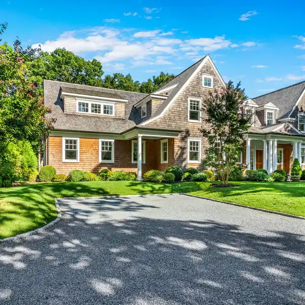 BEAUTIFUL SEVEN BEDROOM RENTAL ON A LANDSCAPED ACRE