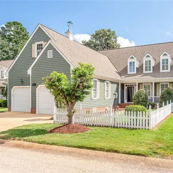 EXCEPTIONAL HOME WITH INVITING FOUR-SEASON ROOM