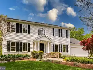 Elegant Colonial Retreat on Tranquil One-acre Lot