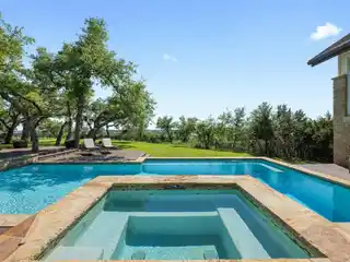The Epitome of Hill Country Living in Coveted Belvedere