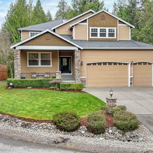 CUSTOM HOME ON EXPANSIVE PROPERTY