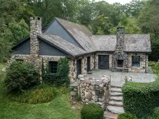 Storybook Stone Cottage with 2000 Feet of Frontage