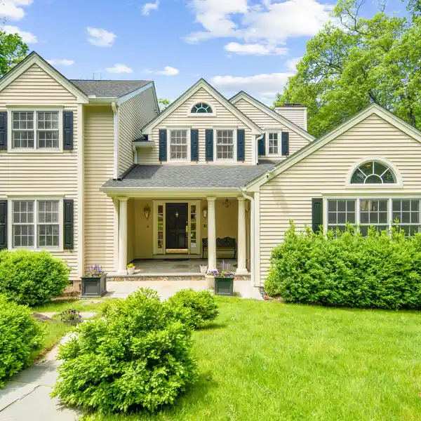 BEAUTIFULLY MAINTAINED COLONIAL HOME WITH MODERN COMFORT