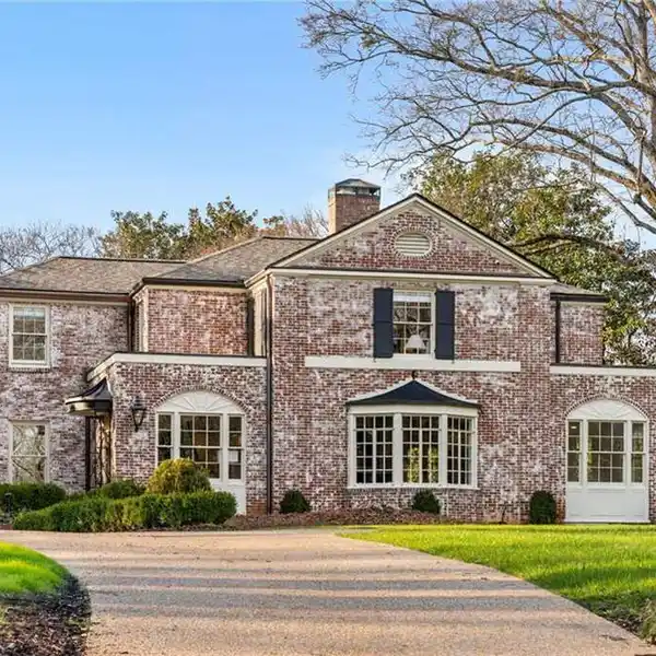 STUNNING BRICK HOME ON THE COVETED ARDEN ROAD