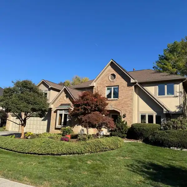 CORNER-LOT CLASSIC WITH VERSATILE LIVING SPACES