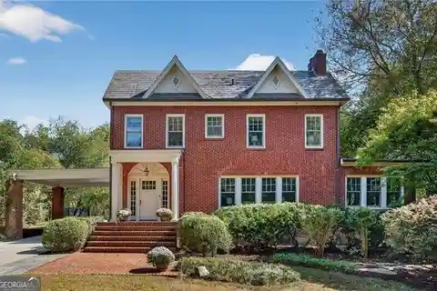 Stately Estate with Timeless Elegance and Cascading Waterfall