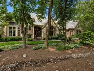 Exceptional Custom Home in the Coveted Gold Coast Neighborhood