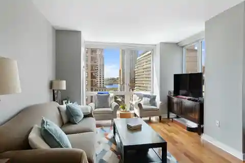 Bright Corner Unit with River Views