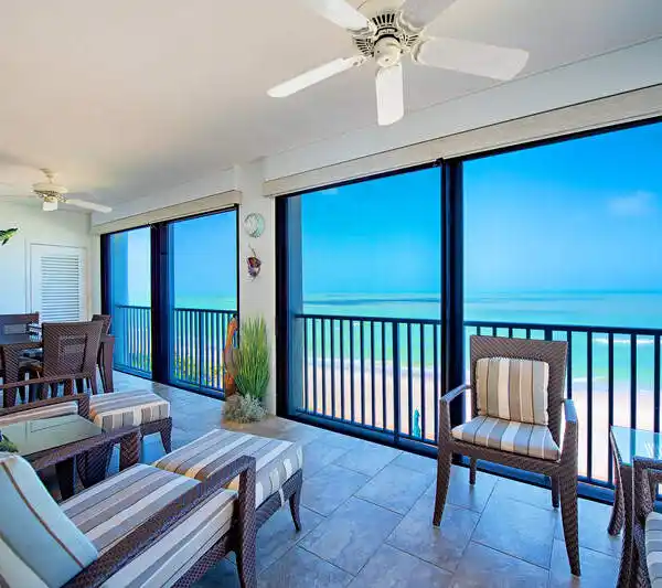 BEACHFRONT END UNIT WITH SWEEPING GULF VIEWS