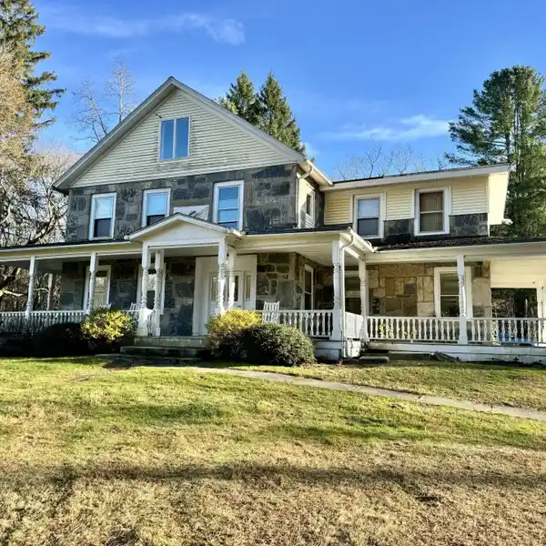 ANTIQUE STONE HOME FULL OF POTENTIAL