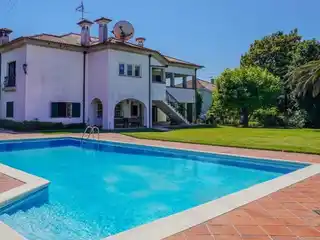 Grand Architectural Harmony with Expansive Private Oasis