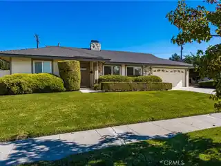 Charming Single-Story Home with Serene Plush Yard