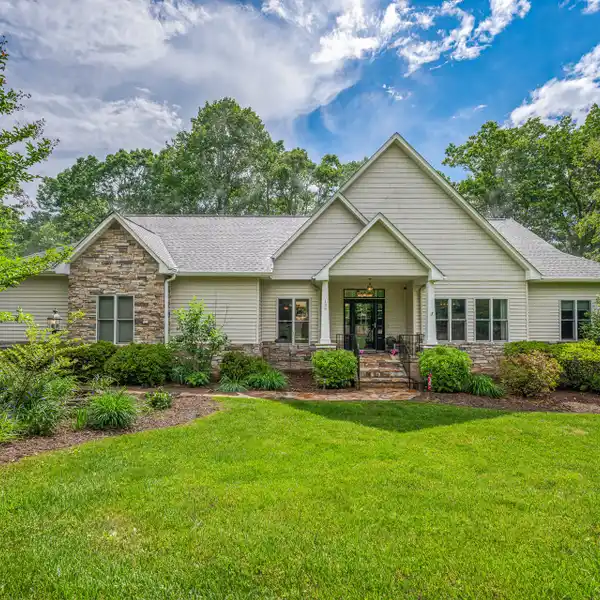 MULTI-LEVEL COMFORT AMIDST SCENIC SEASONAL BEAUTY