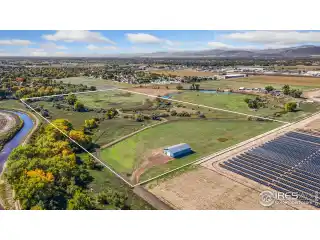 Expansive Acreage with Pond and Mountain Views
