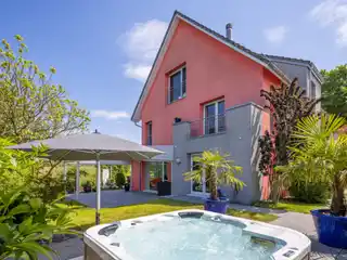 Family Residence with Garden Oasis and Large Garage in Hochfelden