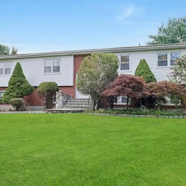 IMPECCABLY MAINTAINED RAISED RANCH