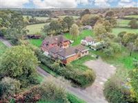 IMPRESSIVE FARMHOUSE ON FOUR ACRES